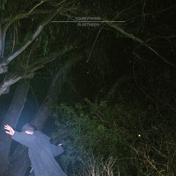 Young Prisms – In Between (LP, Lite Blue Translucent, Kanine Records, 2022) Front Cover