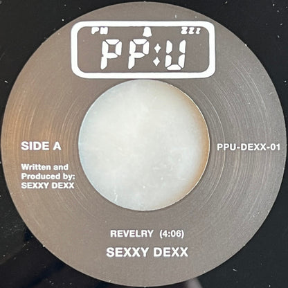 Sexxy Dexx / Delores Galore : Revelry / What's It Bout To Be (7", Single)