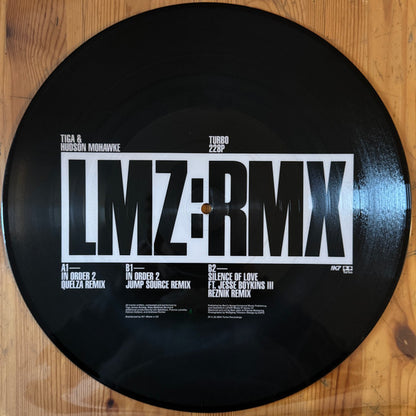 Tiga & Hudson Mohawke : LMZ​:​RMX (12", Pic)