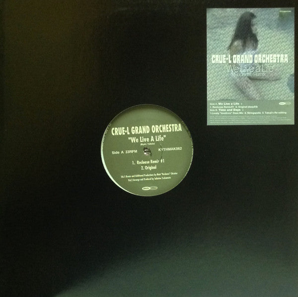 Crue-L Grand Orchestra – We Live A Life (Recloose Remix) (12", Crue-L Records, 2000) Front Cover