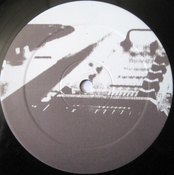 Earth Deuley – Dark Corner / Yoruba (12", Low Pressings Limited, 2002) Back Cover