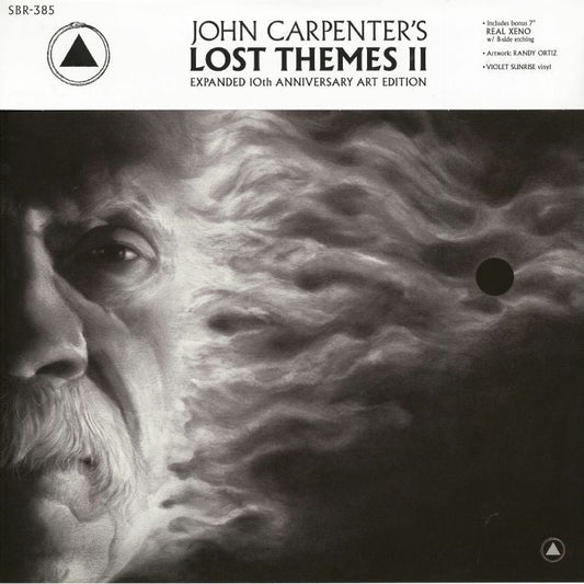 John Carpenter / Cody Carpenter / Daniel Davies – Lost Themes II Expanded (10th Anniversary Art Edition) (2xLP, 10th Anniversary Art Edition) | (Neon Violet, Sacred Bones, 2026) Front Cover