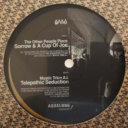 The Other People Place Ft. Mystic Tribe A.I. – Sunday Night Live At The Laptop Cafe (12", Brown / Black Marbled, Clone, 2025) image 02
