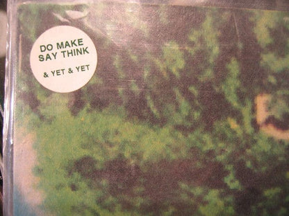 Do Make Say Think – & Yet & Yet (LP, Constellation, 2002) Back Cover