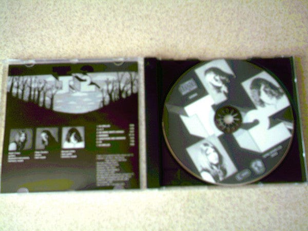 T2 – It'll All Work Out In Boomland (CD, World Wide Records, 1992) Image 3